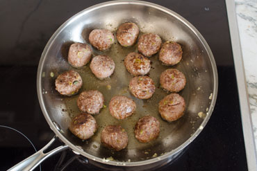 Jesuits Asian meatballs on snow peas picks